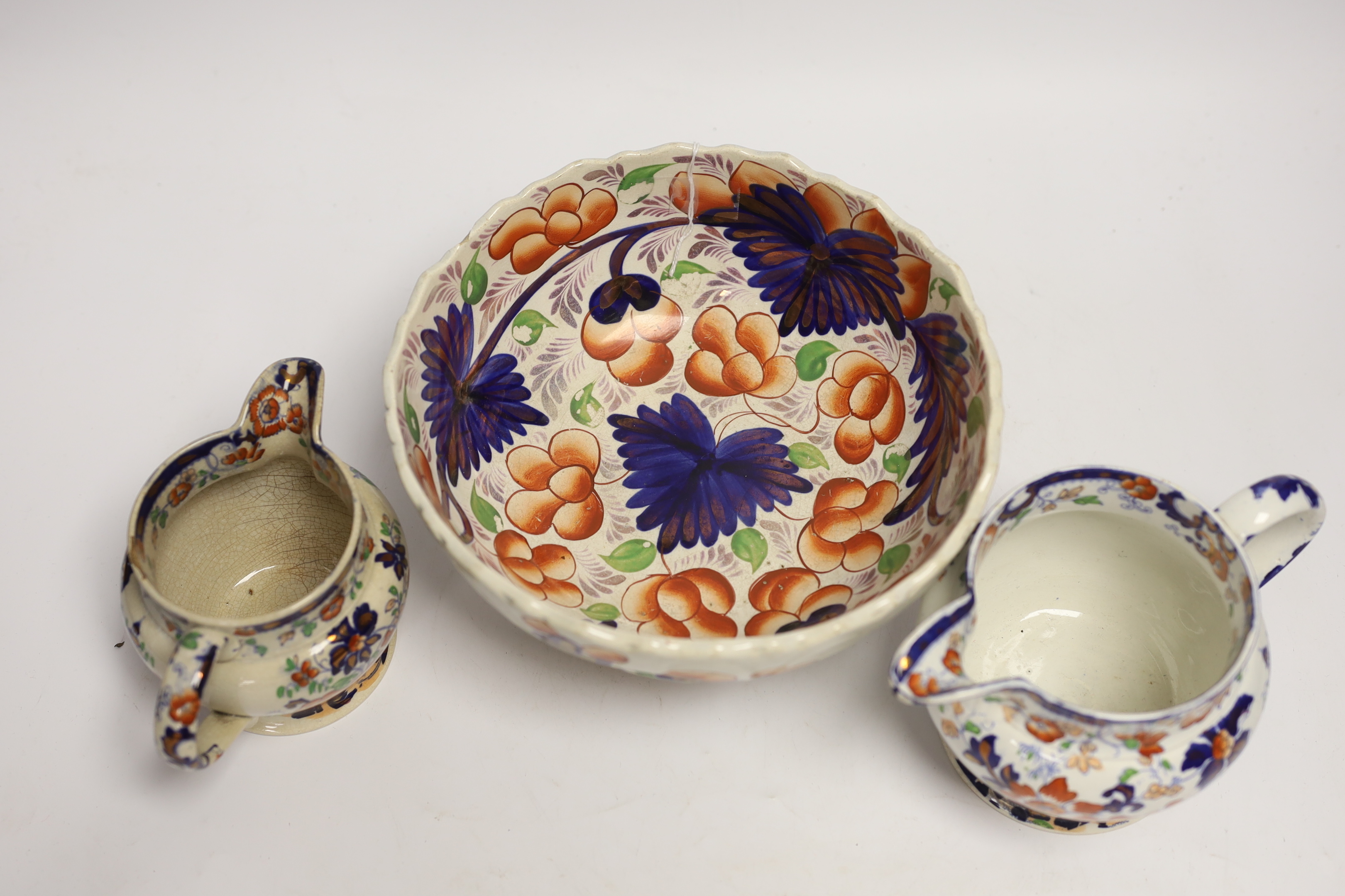 Five Welsh ‘Gaudy’ coffee cans, a large pedestal bowl and two Staffordshire jugs, bowl 21cm diameter
